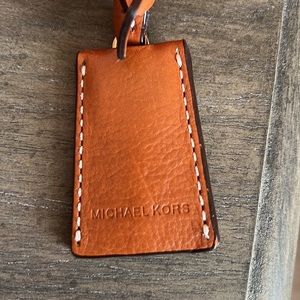 Michael Kors orange/cream/brown Hamilton bag.